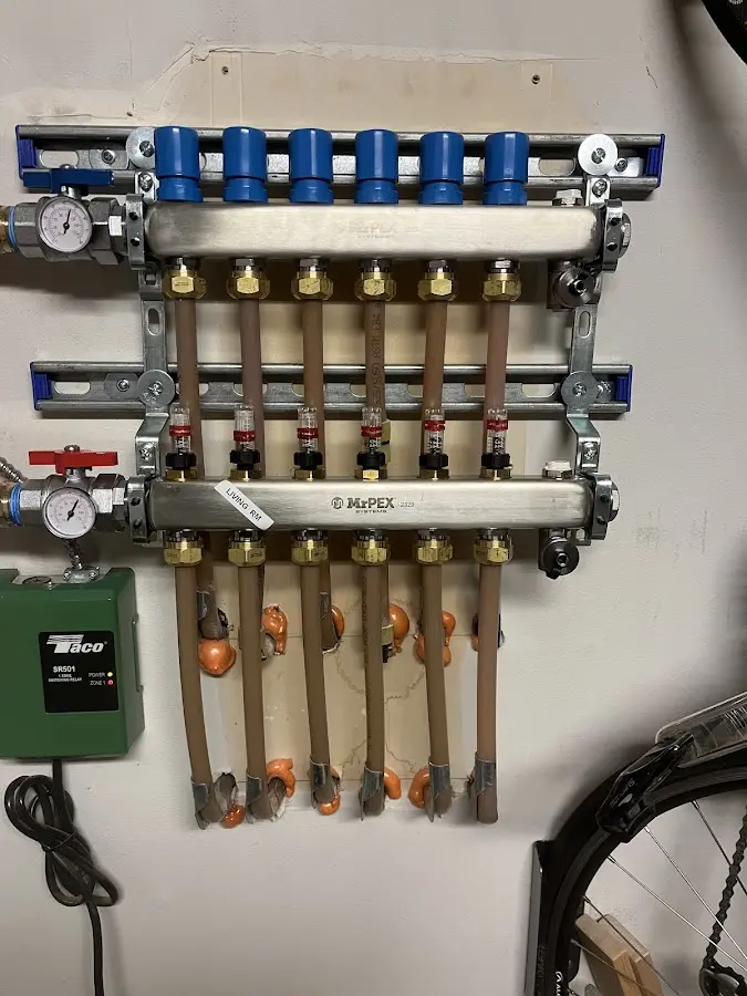 Plumber performing Water Heater Repair at a residential property in Minnehaha